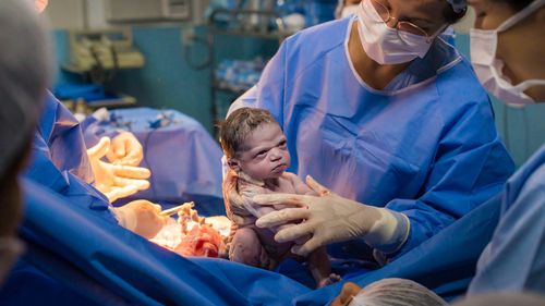 Welcoming the newborn, the father was afraid to hold. But the doctor congratulated their family